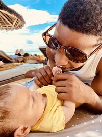 Portrait of senior woman sitting at beach