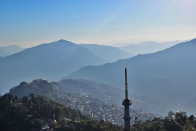 View of communications tower in city