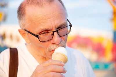 Close-up of man with ice cream
