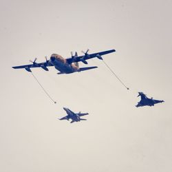 Low angle view of airplane flying in sky