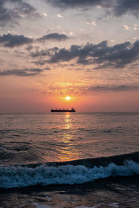 Scenic view of sea against sky during sunset