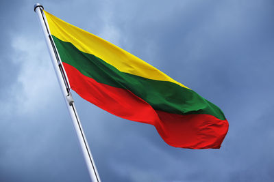 Low angle view of flag against sky