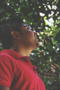 Close-up of man looking up