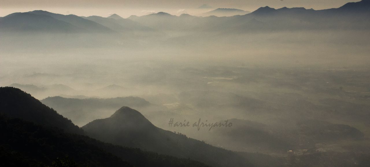 mountain, mountain range, scenics, tranquil scene, tranquility, beauty in nature, nature, landscape, sky, idyllic, fog, non-urban scene, physical geography, majestic, remote, weather, outdoors, no people, cloud - sky, geology