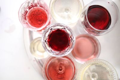 High angle view of alcohol in glasses on table