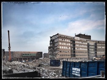 Buildings in city against sky