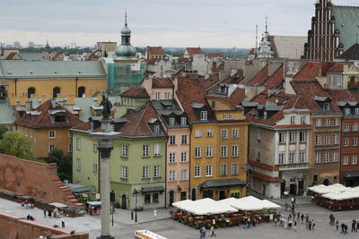 Buildings in city against sky