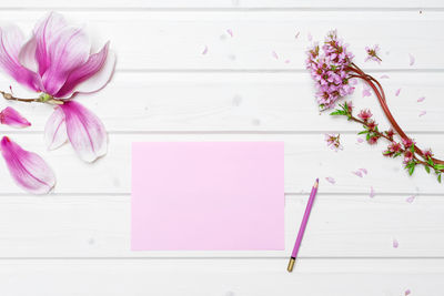 Directly above shot of pink flower on table