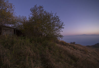 Scenic view of calm lake against clear sky