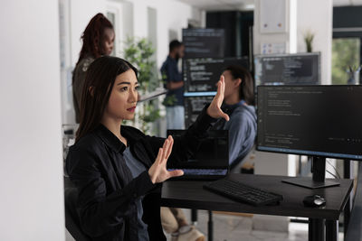 Young businesswoman working in office