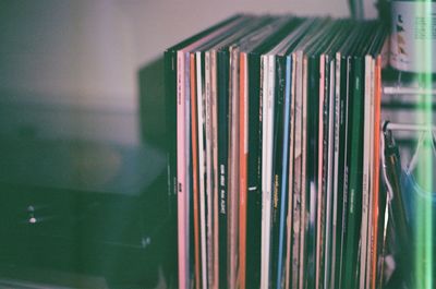 Close-up of records on shelf