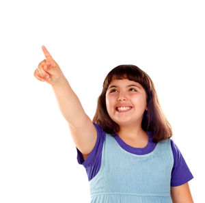 Portrait of smiling young woman against white background