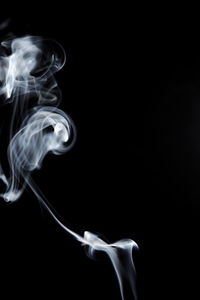 Close-up of smoke against black background