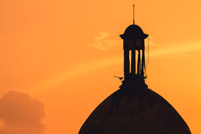 Low angle view of silhouette temple against sky during sunset