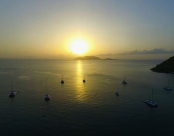 Scenic view of sea against clear sky during sunset