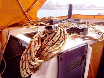 Close-up of clothes hanging in boat