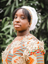 Portrait of young woman looking away