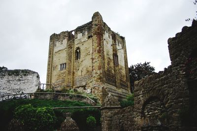 Low angle view of old building against sky