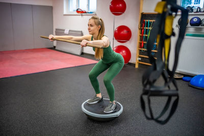 Man exercising in gym