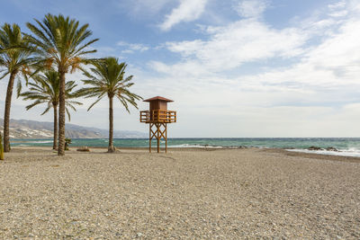 Scenic view of beach against sky