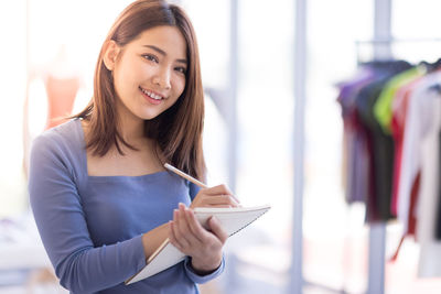 Portrait of a smiling young woman