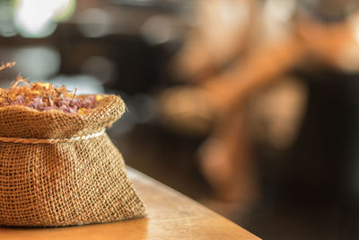 Close-up of sack on table