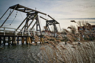 View of bridge over river against sky