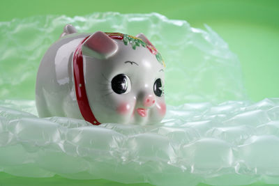 Close-up of toy floating on water