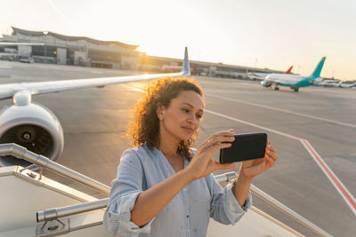 Young woman using mobile phone