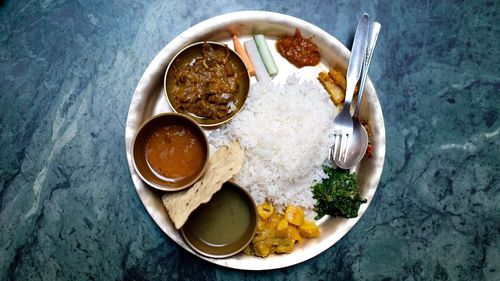 Directly above shot of meal served in plate on table