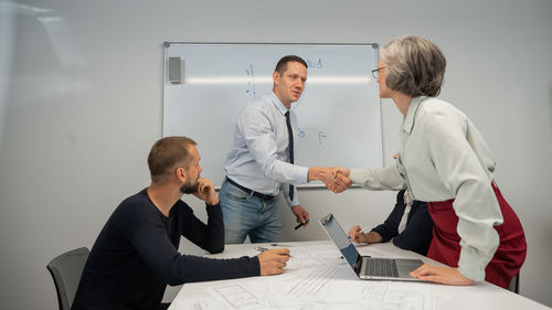 Business colleagues working at office