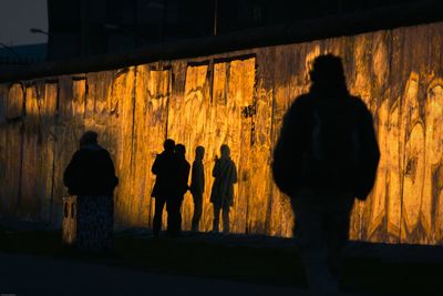 Silhouette of people at night