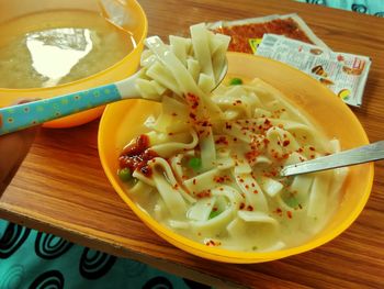 Close-up of served food on table