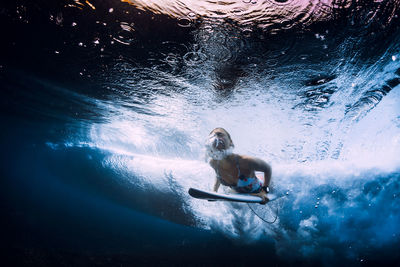 Man swimming in sea