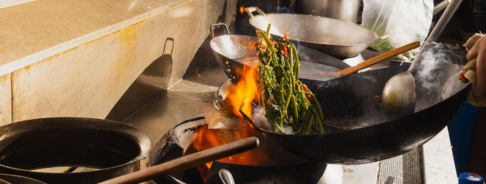 Stir fry vegetable in wok, panorama photo