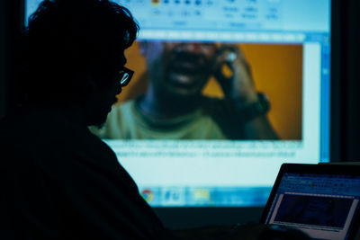 Portrait of a man using mobile phone