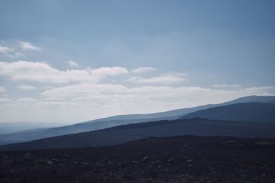 View of landscape against cloudy sky