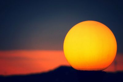 Close-up of orange sun