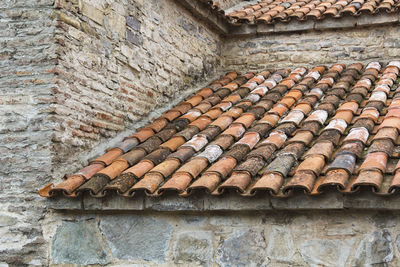 Low angle view of stone wall of old building