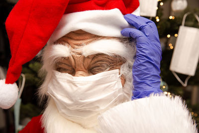 Young man wearing mask at store