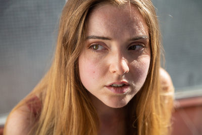 Close-up portrait of young woman