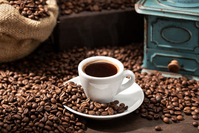 Close-up of coffee cup on table