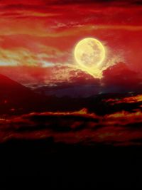 Scenic view of moon at sunset