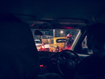 Rear view of people working in bus