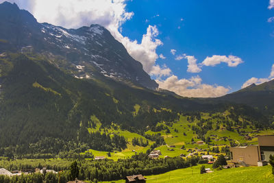 Scenic view of landscape and mountains against sky