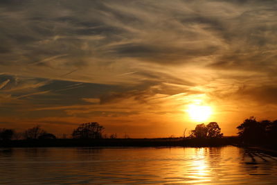 Scenic view of dramatic sky during sunset