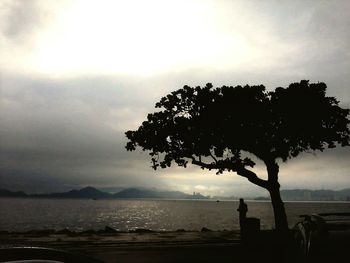 Scenic view of landscape against sky at sunset