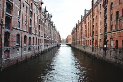 View of canal along buildings