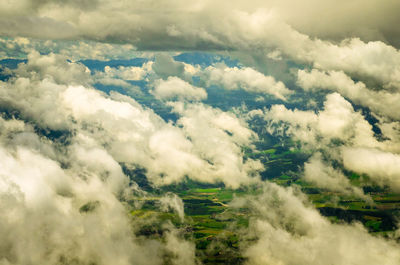 Scenic view of landscape against cloudy sky