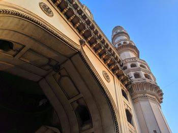 Low angle view of building against blue sky